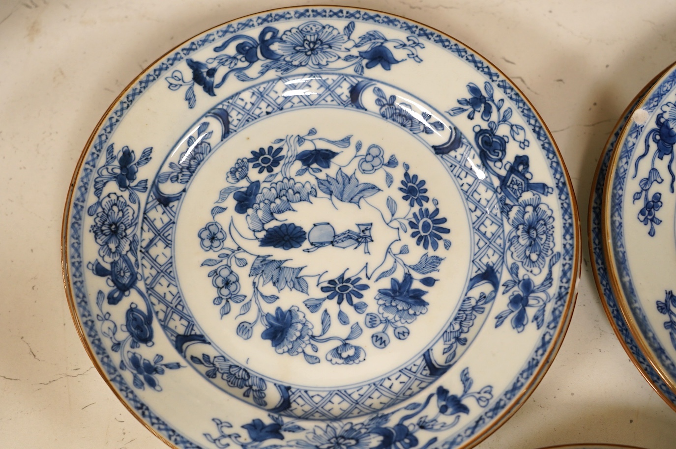 Ten 18th century Chinese export blue and white porcelain plates, each 23cm diameter. Condition - fair, some minor chipping